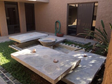 Fountain in entry courtyard.