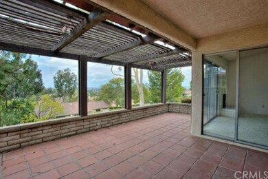 Open back patio is big and offers fantastic views.