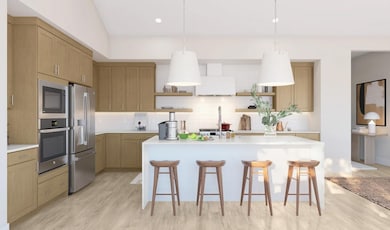 Kitchen with quartz island & floating shelves