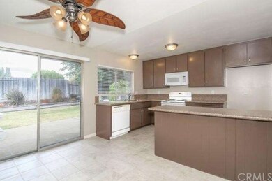 View of Back Yard from Kitchen with Pass Through W