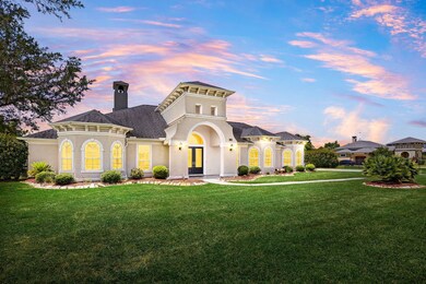 Elegant single-story estate on over an acre, featu