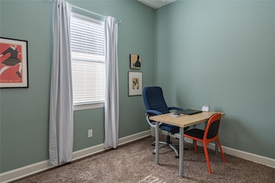 Downstairs secondary bedroom suite currently being used as an office