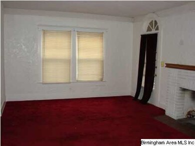 Living room and front door on the right