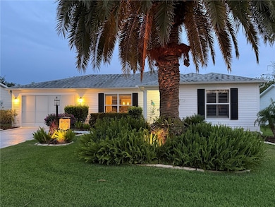 FRONT EXTERIOR - highlighting the Sylvester Palm tree