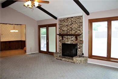 Living room, vaulted ceilings.  Fireplace with gas
