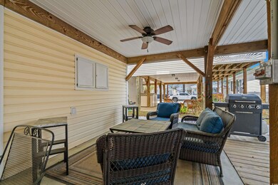 Wooden terrace featuring an outdoor living space, 