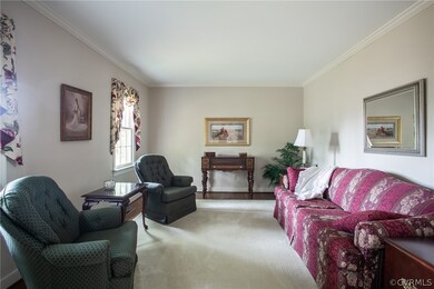Living Room - Hardwood flooring, Crown molding
