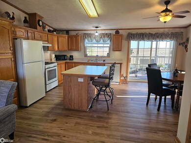 Sliders out to the enclosed porch and deck.