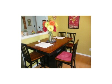 Eating space in kitchen with open wall to Living R