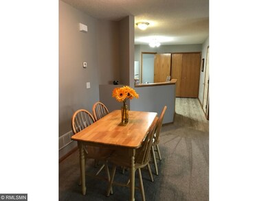 Dining room view into kitchen.