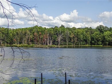 Located on beautiful Mud Lake, this home offers an