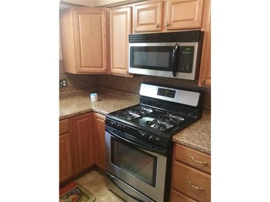 Stove and over range microwave staying with house.