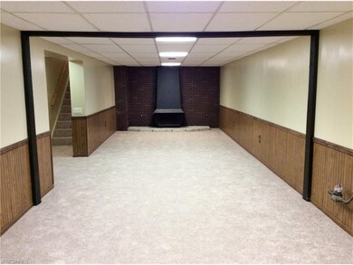 2ND VIEW OF LOWER LEVEL REC ROOM WITH NEWER CARPET