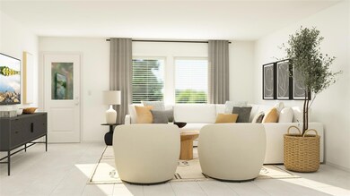 Living room featuring light tile flooring