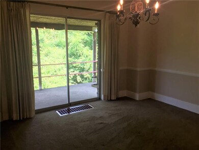 Spacious dining room, sliding doors lead to large 