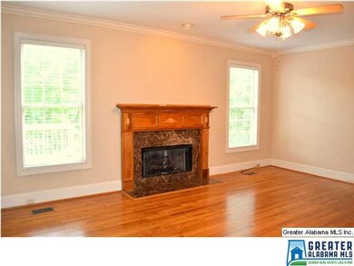 Gleaming hardwood floors and great window light ma