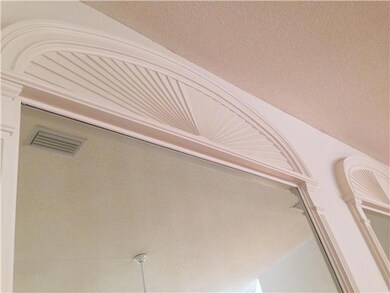 Kitchen. New stainless appliances and granite counters update bright kitchen space