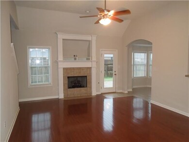 Huge great room with soaring ceilings.  Note the g