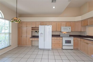 Large kitchen with eat in area.