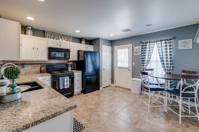 Eat in kitchen. Includes stove, built in microwave