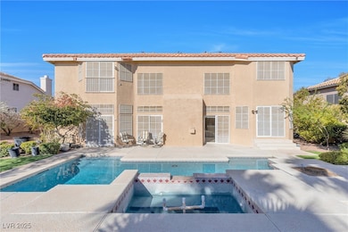 View of swimming pool with a pool with connected h