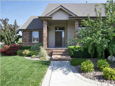 Covered front porch with new brick front steps inv