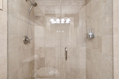 Seamless glass shower at the guest bathroom.