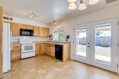 Kitchen w/ Hickory Cabinets