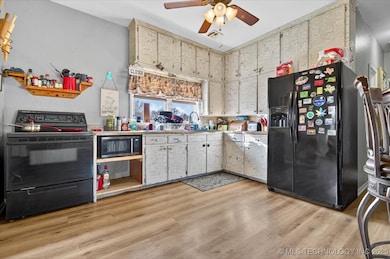 398300 W 450 Rd, Copan, OK 74022 - photo 6