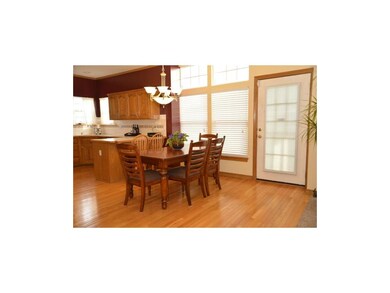 Dining area.  Door leads to an AMAZING deck.
