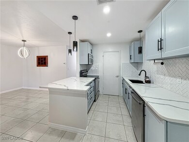 Kitchen featuring appliances with stainless steel