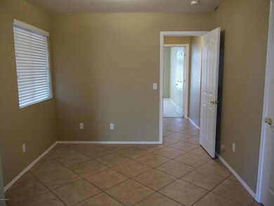 Den connected to the family room