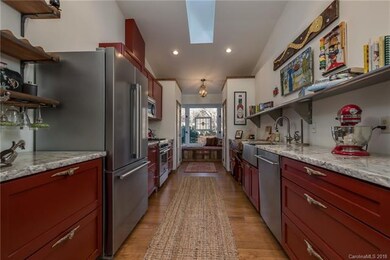 Kitchen with granite counters, stainless appliance