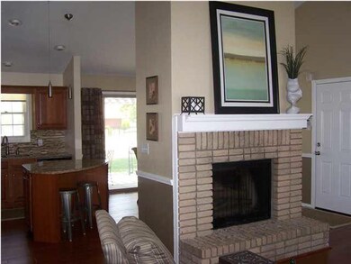 View of Open Floor Plan and Wood Burning Fire Plac