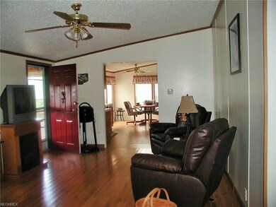 Living room w/hardwood floors.. Step out onto the 