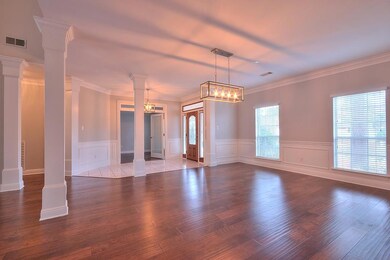 View of Dining Room and Foyer, Front Door on Right