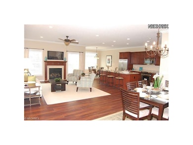 Great room with separate dining area opens to kitc