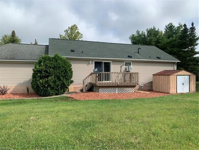 View of back of the home and deck.
