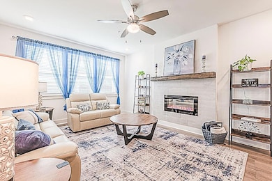 Living room featuring recessed lighting, baseboard