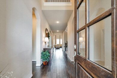 The entry has an exceptional foyer that gives plenty of room for decorating some of your favorite furnishings.  To the left is a bedroom with a full bathroom and to the right you will find the laundry room, bonus room and garage.