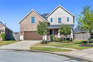 2-car garage with sprinkler system, water softener system and gutters.
