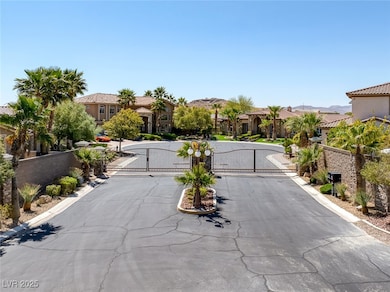 View of road with a residential view, a gated entr