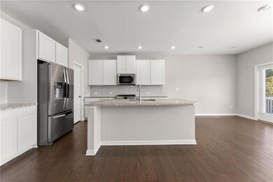 156 Round Pond Dr, Lilburn, GA 30047 - photo 7