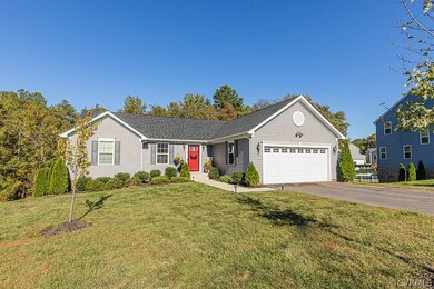 PAVED DRIVEWAY, GARAGE, MAINTENANCE FREE VINYL