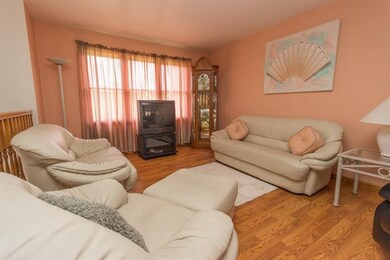 The living room offers ample space without losing 