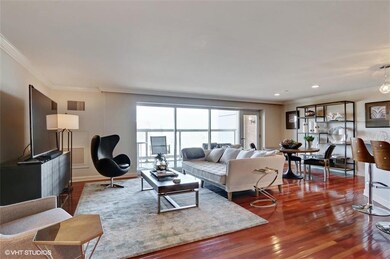 Cherry flooring in living area with Plaza view