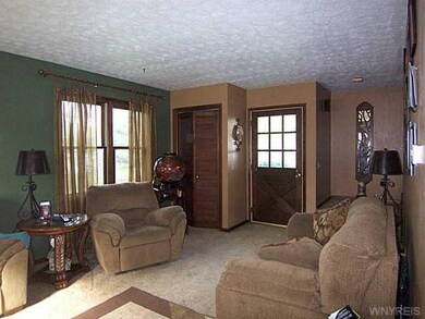 Living Room. ANOTHER VIEW OF THE LIVING ROOM W/FRO