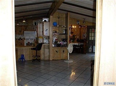 VIEW FROM LIVING ROOM TO KITCHEN & DINING ROOM