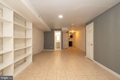 307 E 25th St unit BASEMENT APARTMENT, Baltimore, MD 21218 - photo 7