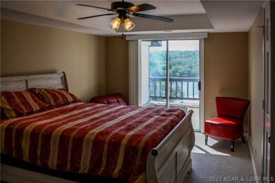 Main level master bedroom with great view of the l